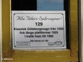 Schild im Wagen 129