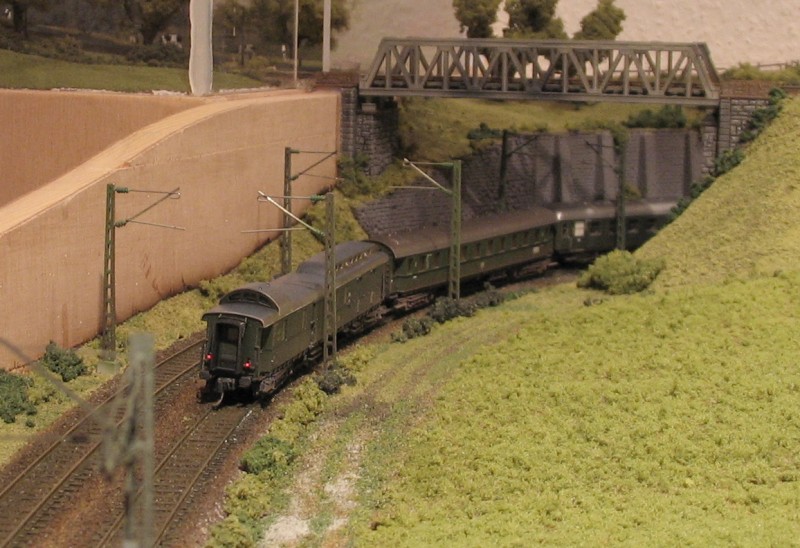 PwPost als Schlusswagen am Schnellzug